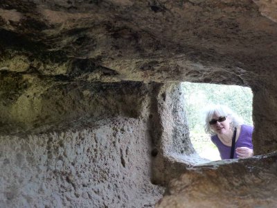 Suzan, looking into an archeological site 2015